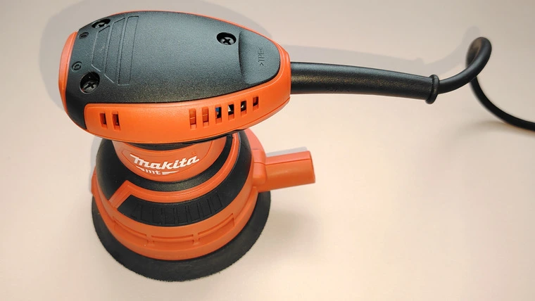 Обзор эксцентриковой шлифмашинки Makita M9204
