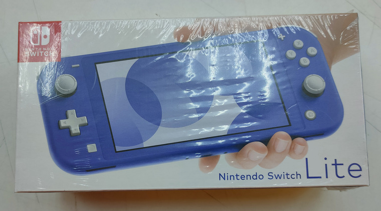 Обзор на портативную игровую консоль Nintendo Switch Lite синего